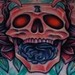 Skulls and roses on chest Tattoo Design Thumbnail